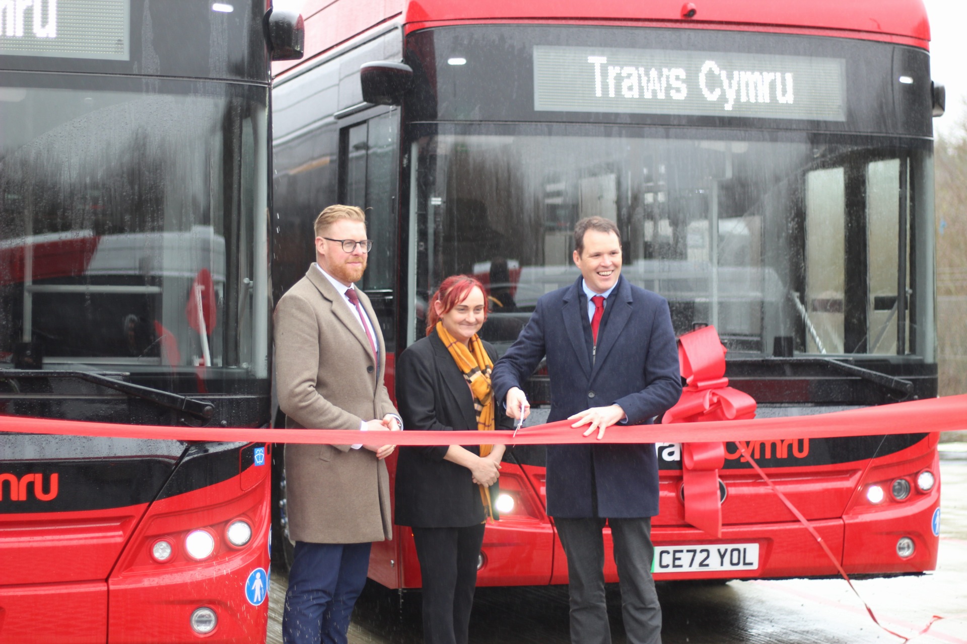 Cutting the ribbon on the launch of the new T1 service and new electric buses 