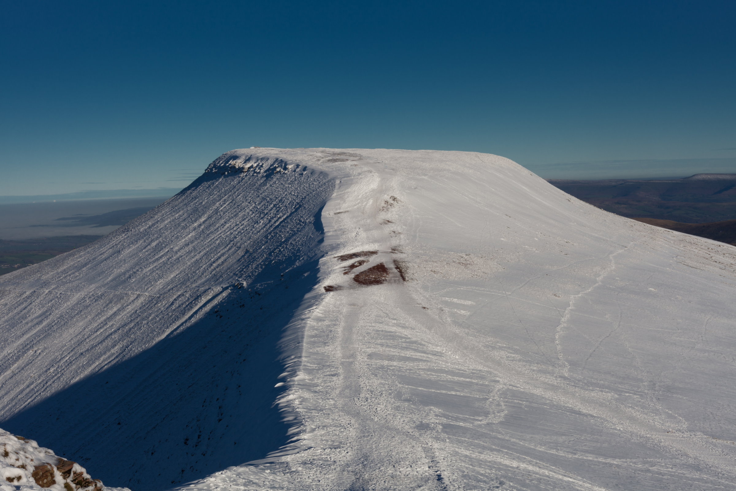 Image of snow covered Pen y fan mountain  